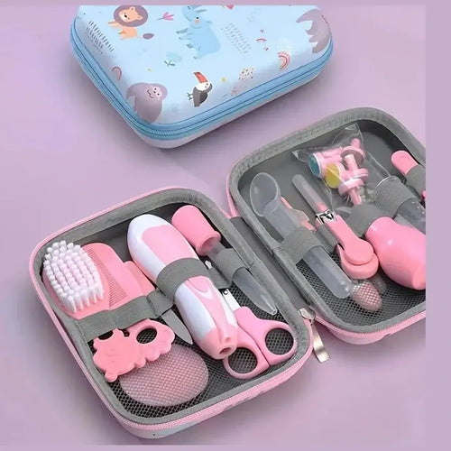 20-piece baby grooming kit essentials organized in a zippered case with various grooming tools in pink.