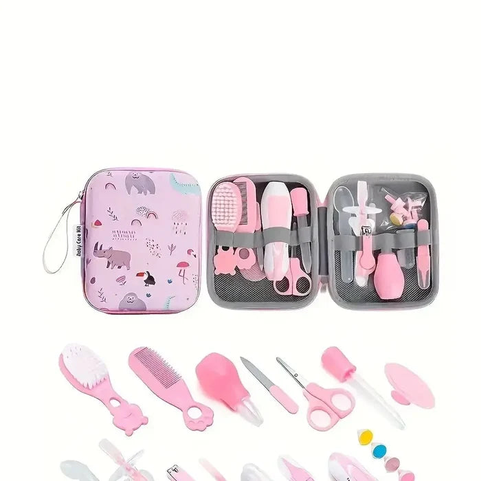 20-piece baby grooming kit essentials including hairbrush, comb, nail clippers, and more in a pink zippered case.