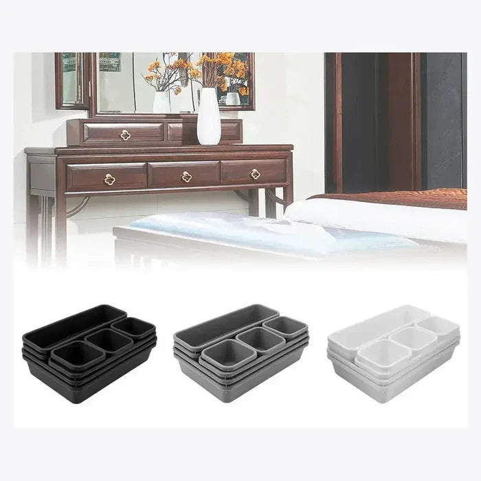 8-piece modular makeup organizer set in black and white, designed for tidy vanity storage.