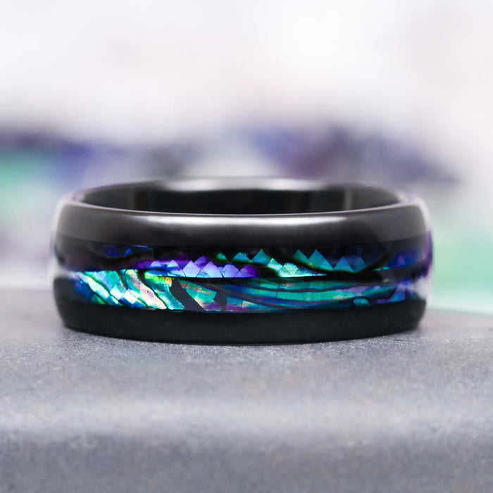 Skye Kite® London Blue Topaz & Abalone Shell Couples Ring Set by Aquamarise, featuring black finish with iridescent abalone shell inlay, matching couples rings inspired by nature and fantasy.