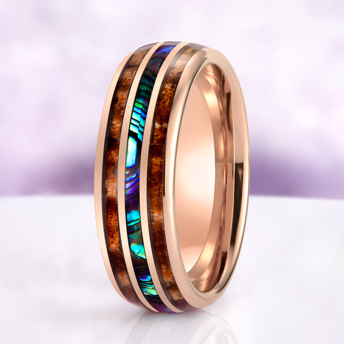 seashell wedding band with whiskey barrel wood inlay on purple background