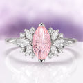 Adeline Unique Fireworks Cut Morganite Couples Ring Set by Aquamarise featuring a marquise-cut pink morganite center stone surrounded by crushed diamond cubic zirconia accents on a polished sterling silver and tungsten band, part of Matching Couples' Rings and Fantasy-Inspired Jewelry collections.