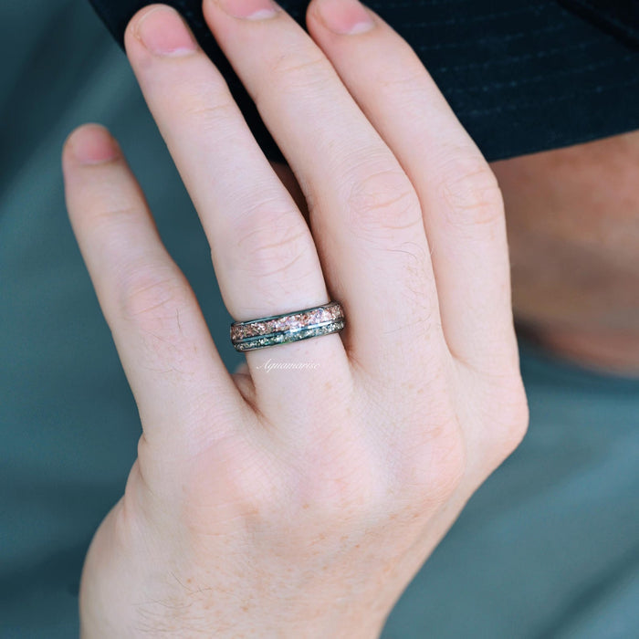 Adeline Unique Fireworks Cut Morganite Couples Ring Set shown on finger, featuring sparkling marquise-cut morganite and crushed diamond cubic zirconia accents set in matching sterling silver and tungsten bands by Aquamarise.