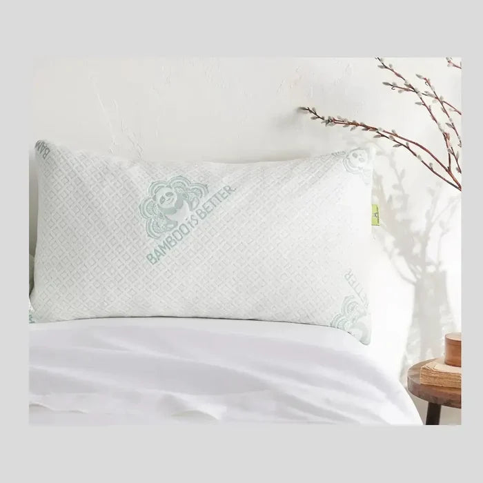 Adjustable Bamboo Cooling Pillow with soft fabric cover on a bed, designed for customizable comfort and support.