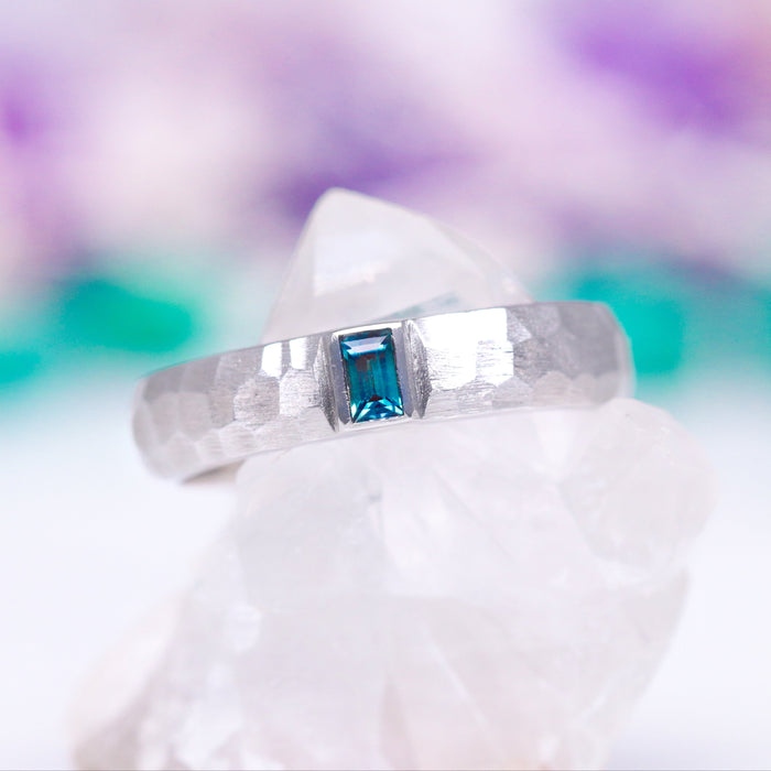 Alexandrite Hammered Wedding Band in Sterling Silver (5.5mm) by Aquamarise showcasing a brushed hammered silver band with a rectangular blue-green alexandrite stone, part of Sterling Silver Rings, Men’s Wedding Bands, and June Birthstone Jewelry collections.
