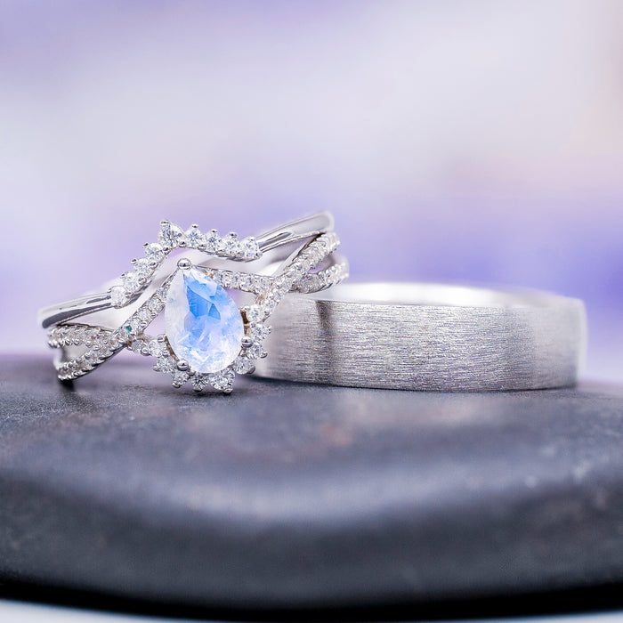 Alice Rainbow Moonstone Couples Ring Set by Aquamarise featuring a pear-shaped moonstone with diamond accents and a brushed sterling silver band, part of Matching Couples' Rings and June Birthstone Jewelry collections.