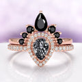 Amy Rutilated Quartz & Black Onyx Ring Set in 14K Rose Gold Vermeil by Aquamarise, featuring pear-shaped rutilated quartz, black onyx stones, and pavé diamonds on elegant rose gold bands.