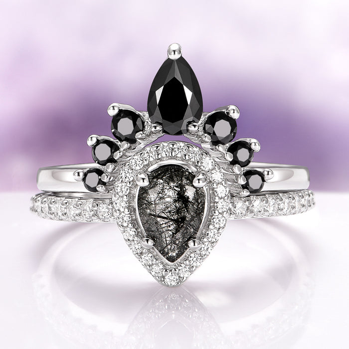 Amy Rutilated Quartz & Black Moissanite Engagement Ring Set in 14K White Gold by Aquamarise Gold, featuring a pear-shaped rutilated quartz center with black moissanite and pavé diamond accents.