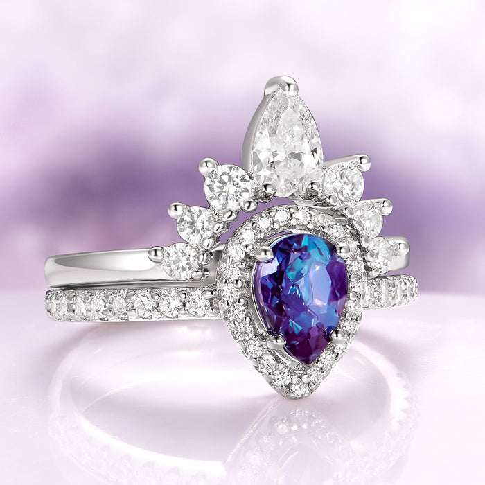 Amy Teardrop Alexandrite Engagement Ring Set in 14K White Gold featuring a pear-cut alexandrite surrounded by sparkling diamonds in an elegant fantasy-inspired design by Aquamarise Gold.