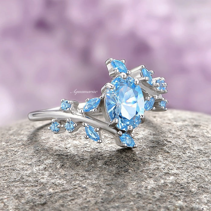 Aquamarine Fairy Leaf Engagement Ring in Sterling Silver by Aquamarise, featuring a sparkling oval aquamarine center stone set in 925 sterling silver with delicate leaf-shaped accents, part of Sterling Silver Rings and Nature-Inspired Engagement Rings collections.