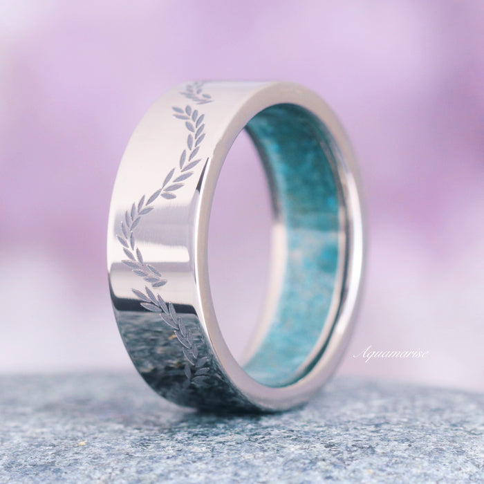 Crushed Aquamarine Leaf Men's Wedding Band in Titanium (8mm) with an engraved leaf pattern and light blue crushed aquamarine inlay by Aquamarise