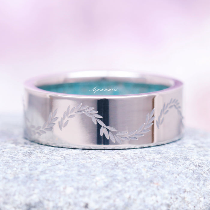 Crushed Aquamarine Leaf Wedding Band- 8MM Titanium featuring an engraved delicate leafy vine design on a high-polish titanium band, part of Aquamarise’s Men’s Wedding Bands and Nature Inspired Men’s Bands Collection.