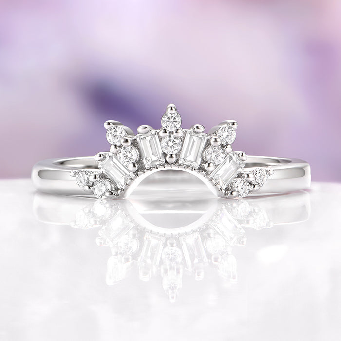 Silver stacking diamond wedding band on purple background