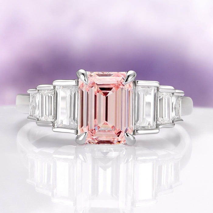 Art Deco Emerald Cut Morganite Engagement Ring in Sterling Silver by Aquamarise, featuring a blush-pink emerald-cut morganite centerpiece flanked by sparkling rectangular side stones, from Sterling Silver Rings and Engagement Rings for Women collections.
