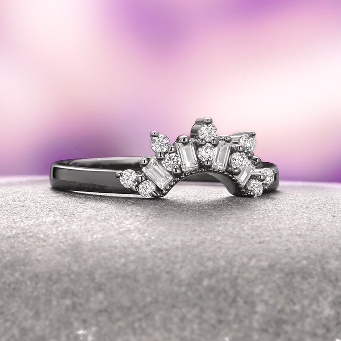 Art Deco Blue Sapphire Ring Set- Black Ruthenium by Aquamarise highlights a black ruthenium over sterling silver band with an arch of baguette and round white gemstones, blending fantasy-inspired design with elegant craftsmanship.