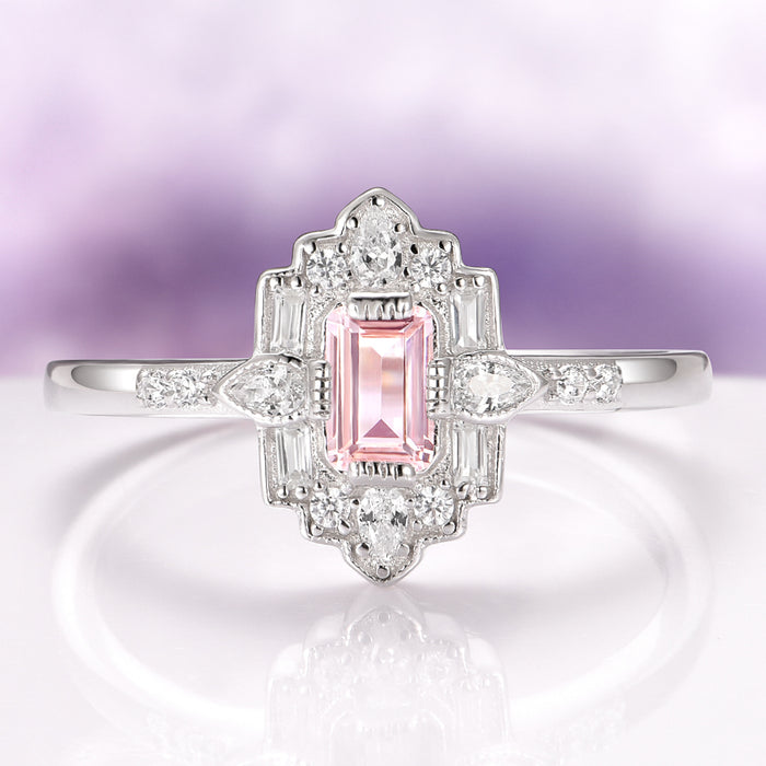 Art Deco Mosaic Morganite Couples Ring Set by Aquamarise featuring a rectangular pink morganite center stone surrounded by diamond accents on a sterling silver band.