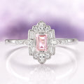 Art Deco Mosaic Morganite Couples Ring Set by Aquamarise featuring a rectangular pink morganite center stone surrounded by diamond accents on a sterling silver band.
