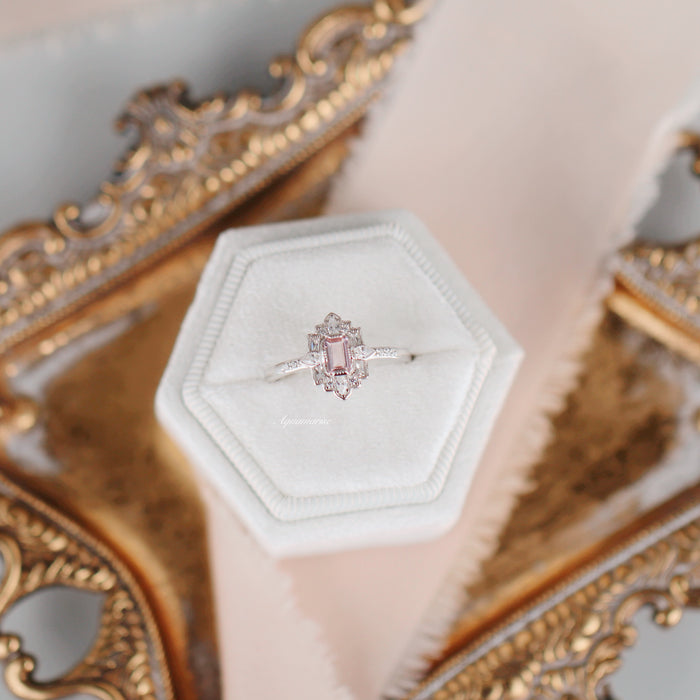 Art Deco Mosaic Morganite Couples Ring Set by Aquamarise showcasing a rectangular morganite center stone with delicate diamond accents on a sterling silver band, styled on a white velvet hexagon cushion.