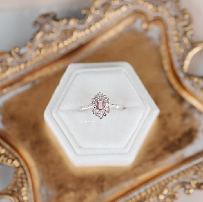 Art Deco Mosaic Morganite Couples Ring Set by Aquamarise featuring a rectangular pink morganite center stone with diamond accents on a sterling silver band, displayed on a white velvet hexagon cushion.