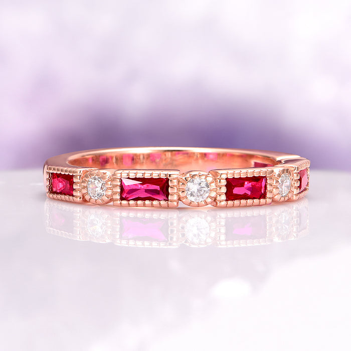 Art Deco Ruby Wedding Band in 14K Solid Rose Gold featuring alternating emerald-cut rubies and round diamonds in a vintage-inspired design by Aquamarise Gold.