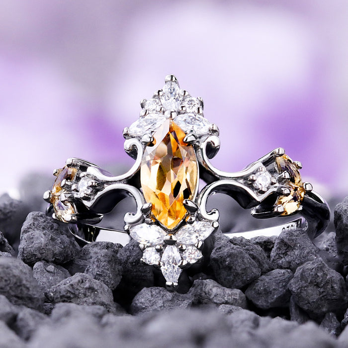Artemisia marquise natural citrine engagement ring in black ruthenium on dark stones, scroll shoulders with cubic zirconia crests