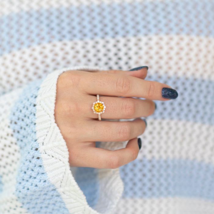 Aster Citrine Ring- 14K Rose Gold Vermeil featuring a round natural citrine center surrounded by simulated diamonds on a delicate rose gold vermeil band by Aquamarise.