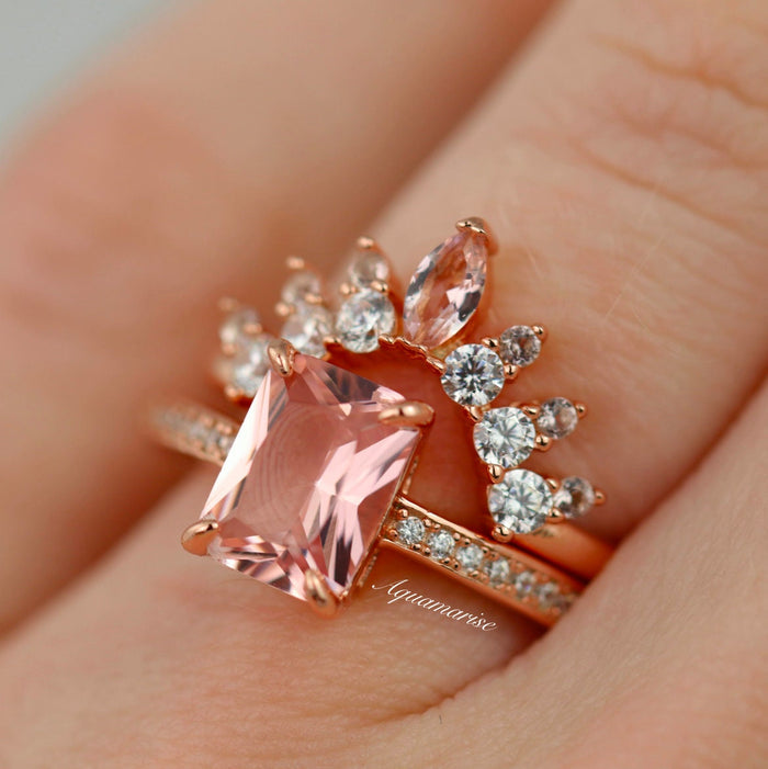 Ava Emerald Cut Morganite Ring in 14K Rose Gold Vermeil by Aquamarise featuring a peachy-pink emerald cut stone with sparkling accent diamonds on a delicate rose gold band.