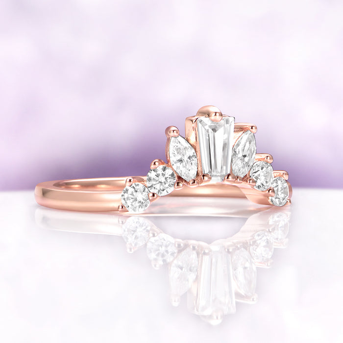 Baguette & Marquise Contour Stacking Ring in 14K Rose Gold Vermeil by Aquamarise, featuring baguette, marquise, and round-cut stones on a curved rose gold band.