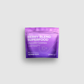 Purple package of Berry Blend Superfood Chewable Gummies on a light gray background