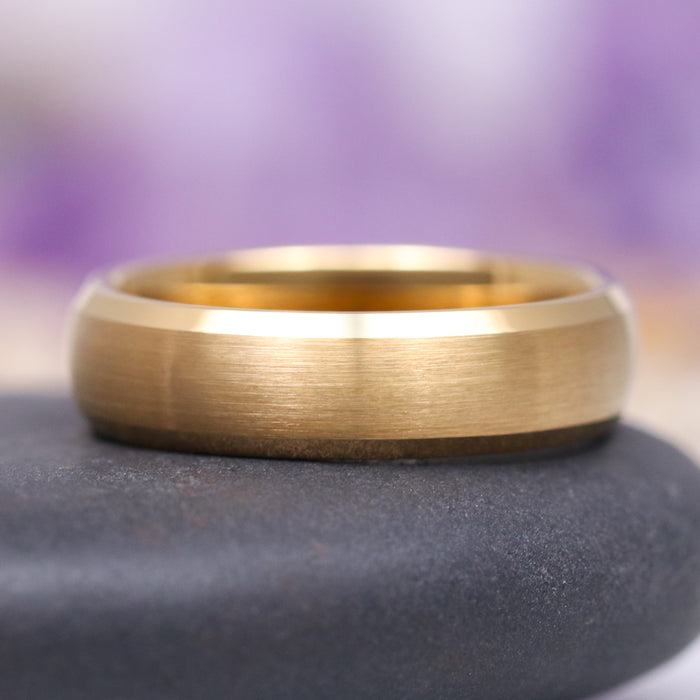 Beveled Edge Satin Wedding Band in 14K Solid Yellow Gold (6MM) by Aquamarise Gold showcases a smooth satin-brushed finish with beveled edges, combining timeless elegance and everyday comfort, perfect for Men’s and Women’s Wedding Bands collections.