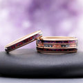 Black fire opal and meteorite couples ring set — matching rose gold tungsten bands with crushed opal inlay