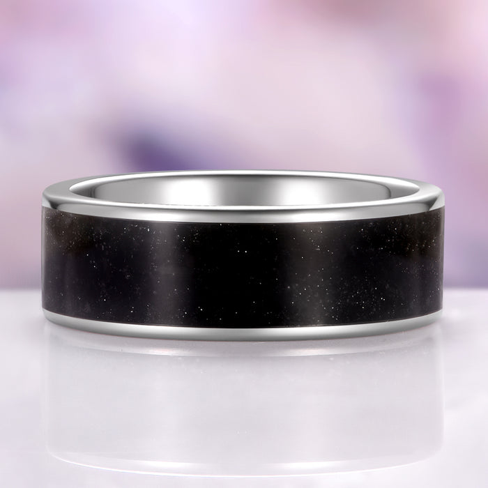 Black Obsidian Wedding Band in Tungsten Carbide (8mm) by Aquamarise, featuring a polished black obsidian stone inlay set in a sleek tungsten carbide band with a smooth comfort-fit interior, part of Men’s Wedding Bands and Inlay Wedding Bands collections.