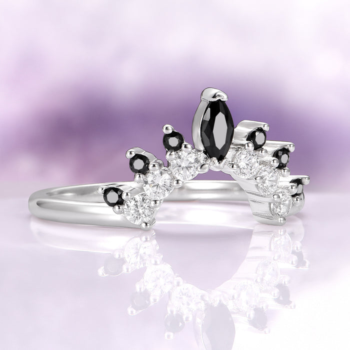 Black Onyx Stacking Ring in Sterling Silver by Aquamarise, featuring a curved band with alternating black onyx and clear gemstones for a unique, elegant look.