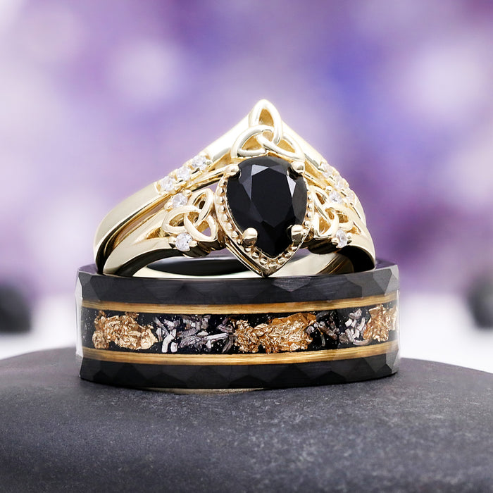 Black Onyx & Meteorite Celtic Couples Ring Set featuring a pear-shaped black onyx with gold filigree and a meteorite inlay band accented with gold flakes by Aquamarise.