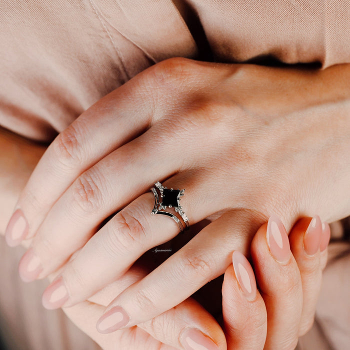 Black Onyx & Meteorite Couples Ring Set by Aquamarise shown on hand with polished black onyx center and diamond accents, symbolizing unity and love in matching couples rings.