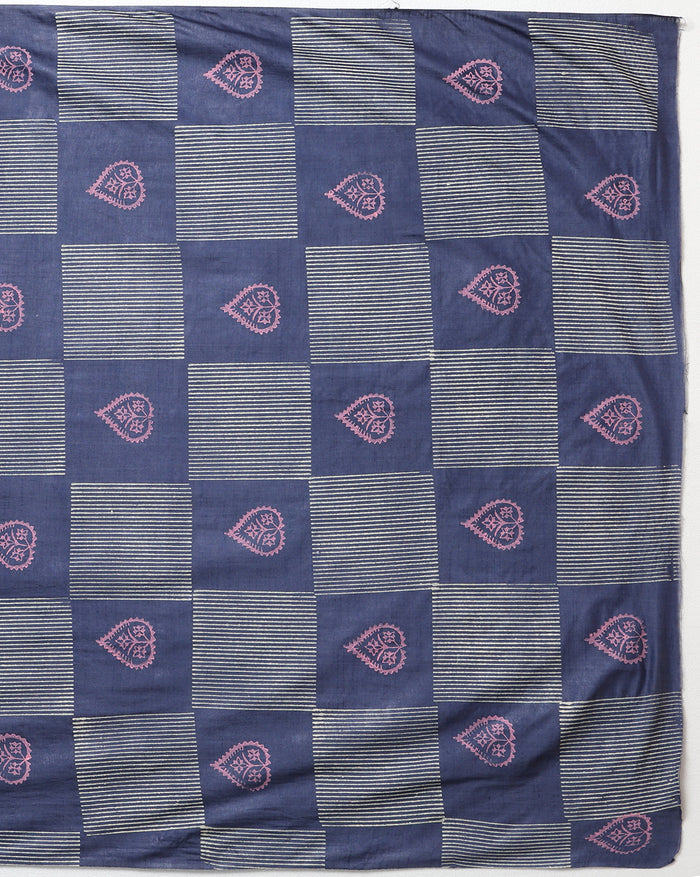 Dark blue Katan silk suit set hand block printed in a checkerboard grid of white and pale pink leaf motifs and vertical stripes, with a botanical border along the dupatta.