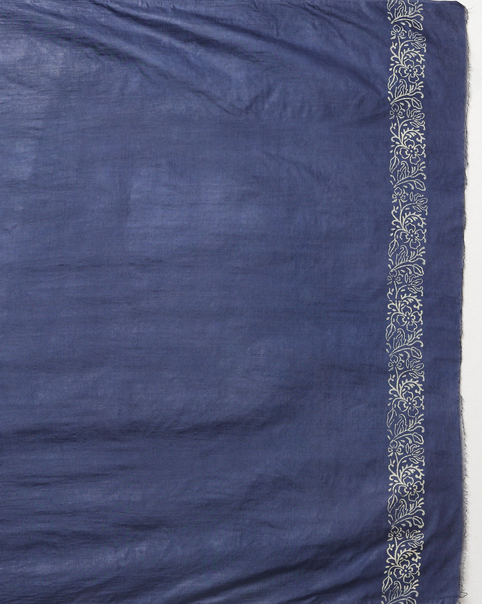 Dark blue Katan silk suit set hand block printed in a checkerboard grid of white and pale pink leaf motifs and vertical stripes, with a botanical border along the dupatta.