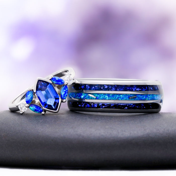 Blue fire opal and sapphire couples ring set — kite sapphire ring beside a silver tungsten opal inlay band