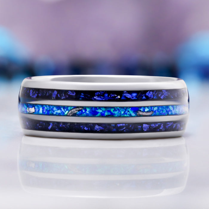 Close-up of the meteorite texture and blue fire opal inlay channel