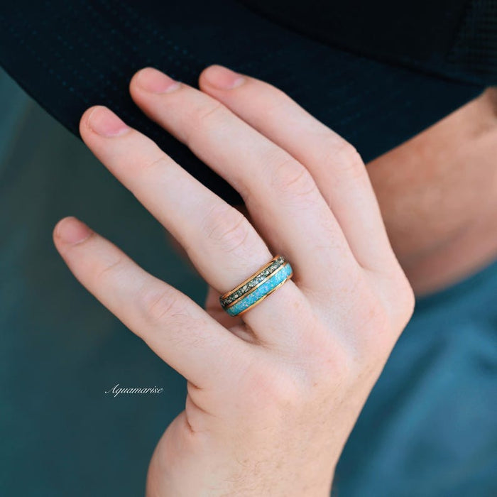 Blue Fire Opal & Crushed Diamond Couples Ring Set featuring vibrant blue fire opal inlay alongside crushed diamond accents set on a gold band, styled by Aquamarise from Matching Couples' Rings and Birthstone Jewelry collections.