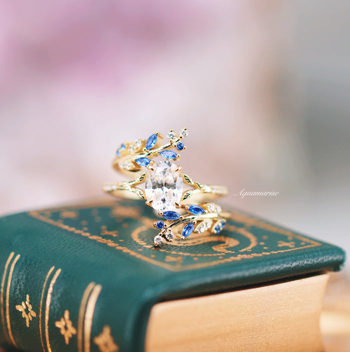 Blue Sapphire and Diamond Leaf Ring Guard in 14K Solid Yellow Gold by Aquamarise Gold, featuring delicate leaf motifs with blue sapphires and sparkling diamonds in an elegant nature-inspired design.