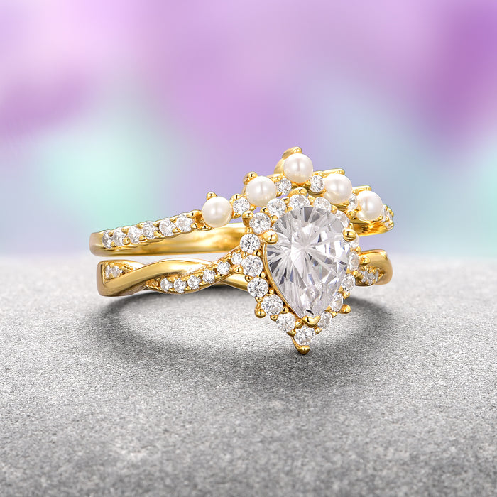 Briar Moissanite Engagement Ring- 14K Solid Yellow Gold (Fantasy Cut) by Aquamarise Gold, featuring a pear-shaped fantasy-cut moissanite surrounded by small pearls and sparkling accents, part of Solid Gold Engagement Rings and Nature-Inspired Engagement Rings collections.