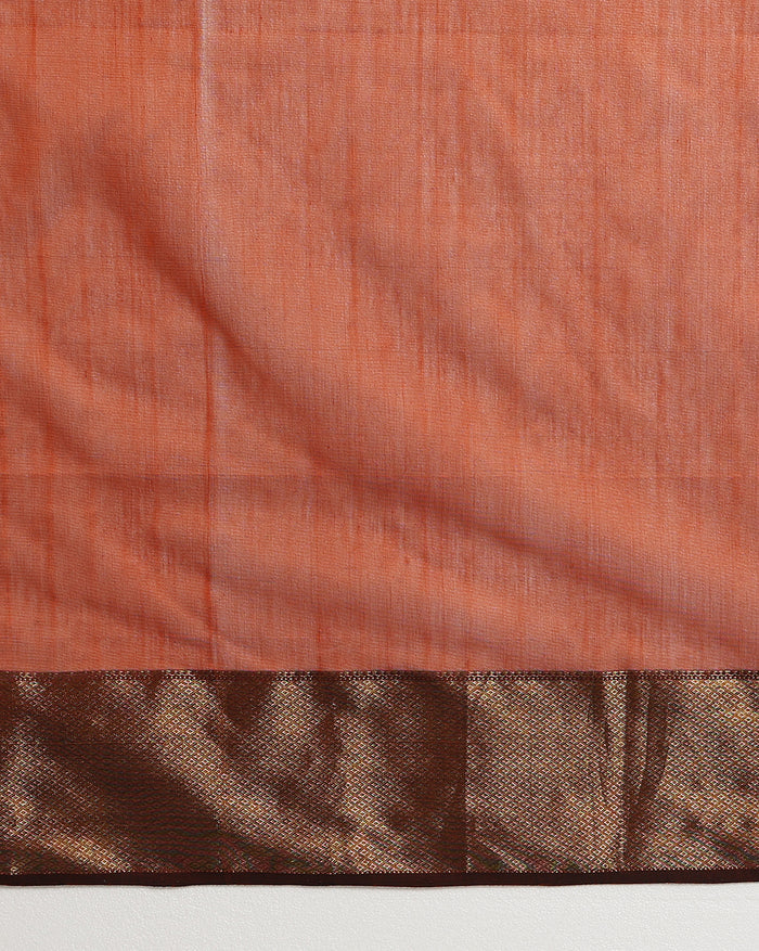 Handloom Maheshwari silk saree in burnt orange, flower buti scattered across the body, with a wide golden zari border
