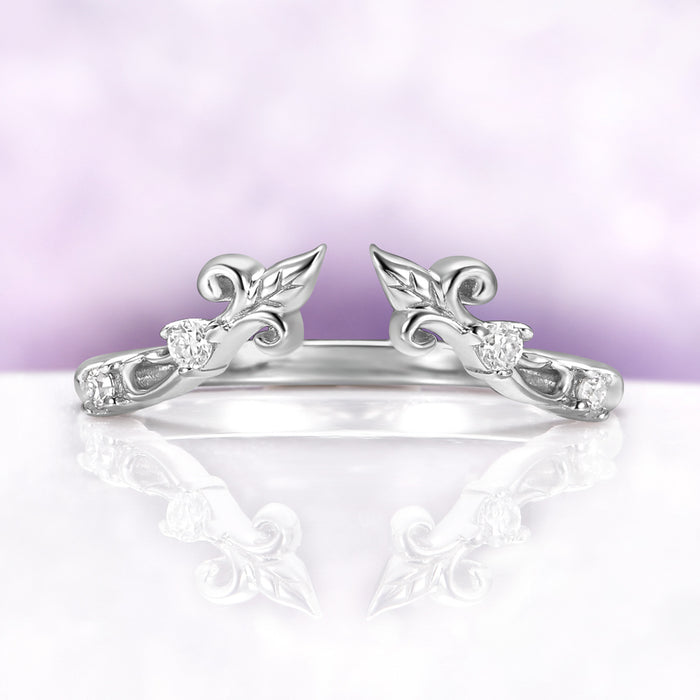 The enhancer band from the Carmilla ruby set, an open leaf and vine wrap in sterling silver