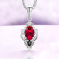 Carmilla lab-grown ruby pendant necklace in sterling silver, oval center with a black onyx pear on a box chain
