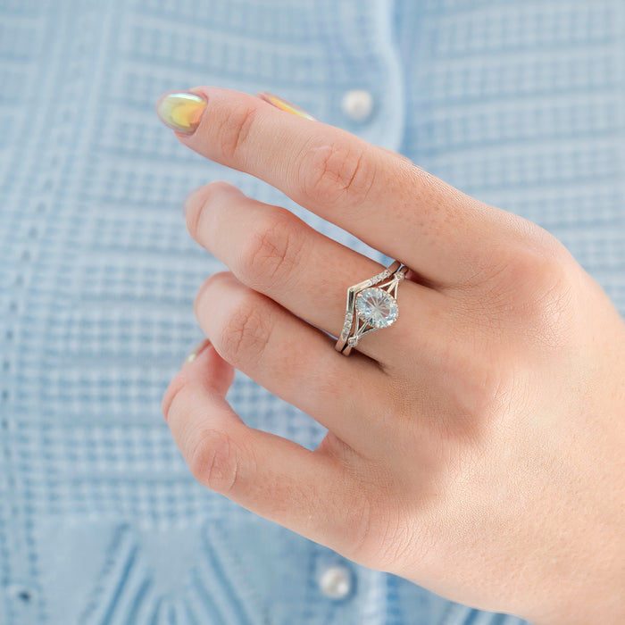 Celtic Aquamarine Couples Ring Set by Aquamarise featuring a sparkling aquamarine gemstone in a delicate sterling silver band with intricate Celtic-inspired detailing, part of Matching Couples' Rings and March Birthstone Jewelry collections.