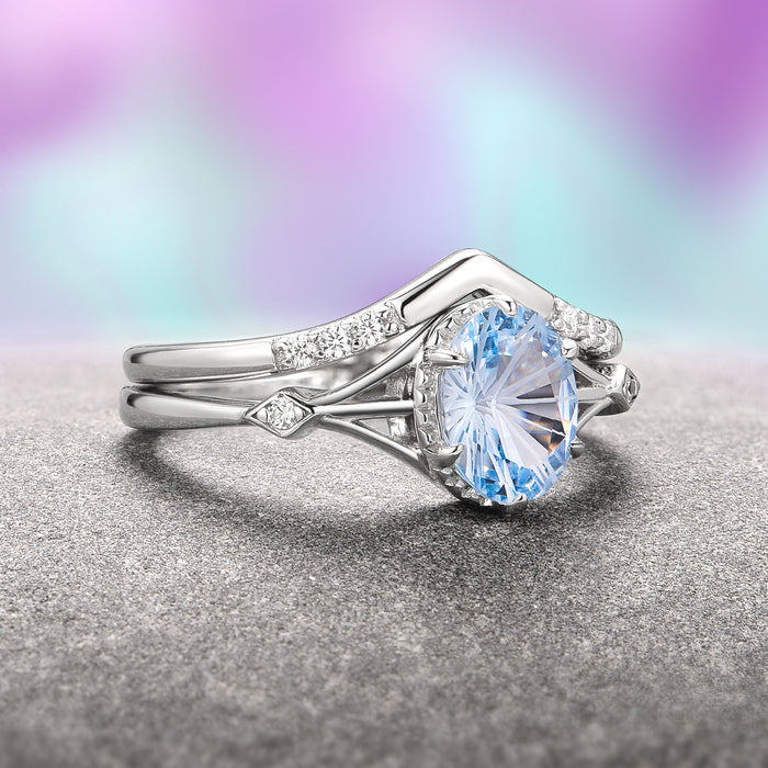 Celtic Aquamarine Couples Ring Set by Aquamarise showcases a radiant aquamarine centerpiece with a delicate sterling silver band accented by small diamonds, blending elegant craftsmanship with symbolic unity in Matching Couples' Rings and March Birthstone Jewelry collections.