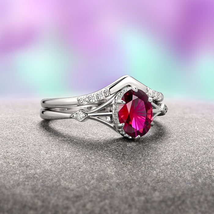 Celtic Ruby Ring Set- 14K White Gold (Two Piece) by Aquamarise Gold, featuring a vibrant red ruby with a star cut center stone, set in an elegant white gold band accented with delicate diamond details, inspired by Celtic fantasy and romance.