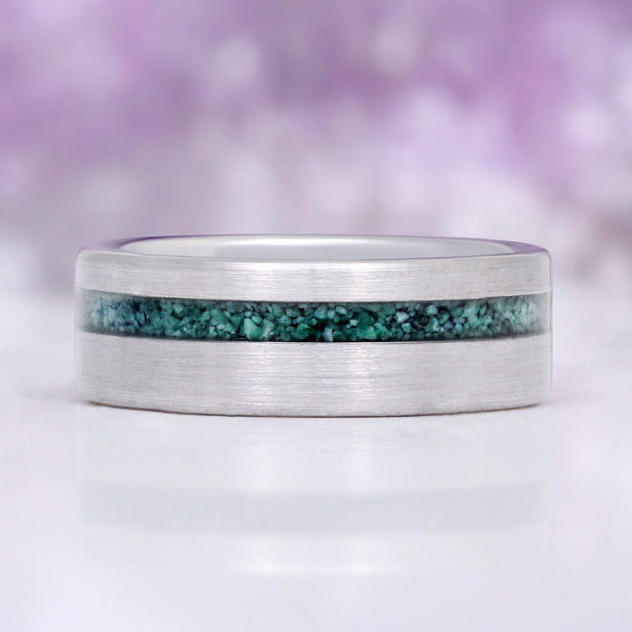 His side of the set: 8mm brushed tungsten band with an off-centre natural moss agate inlay