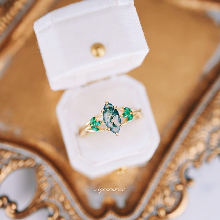 Celtic Knot Moss Agate & Gold Leaf Couples Ring Set, elegant gold ring with green moss agate and leaf accents, displayed in white velvet box by Aquamarise.